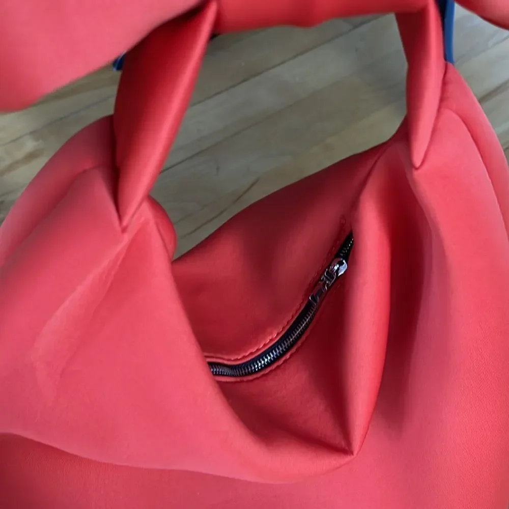 Orange scuba fabric zipper closure large bow strap shoulder bag. - Picture 3 of 4